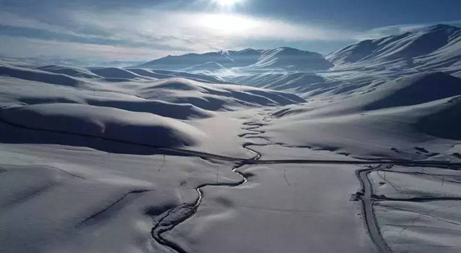 Enchanting Views Meanders in Van Blanketed in Winter's Grace